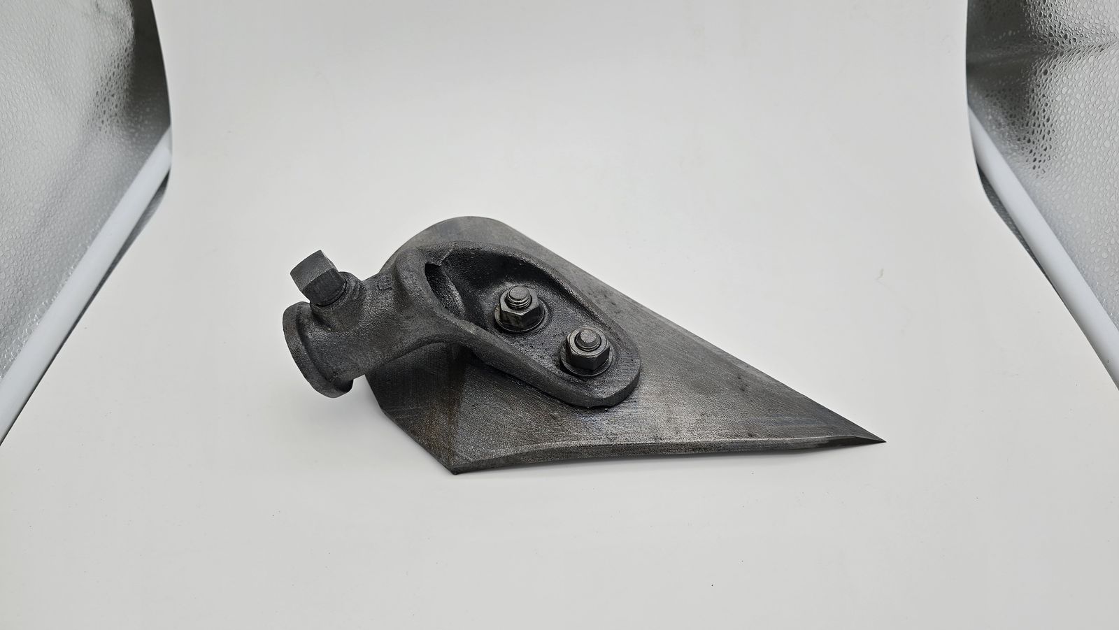 The same cast wedge cleaned to bare metal after laser blasting